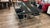 This vintage chrome dining table set features a sleek rectangular chrome frame, a clear plexiglass top, and four high-back...