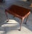 Fine 18th Century Mahogany Side or Tea Table with a scalloped skirt centered by a prominent shell carving on both front...