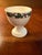 The Wedgwood Napoleon Ivy Queensware Single Egg Cup is a vintage piece of decorative cookware that embodies the elegance...