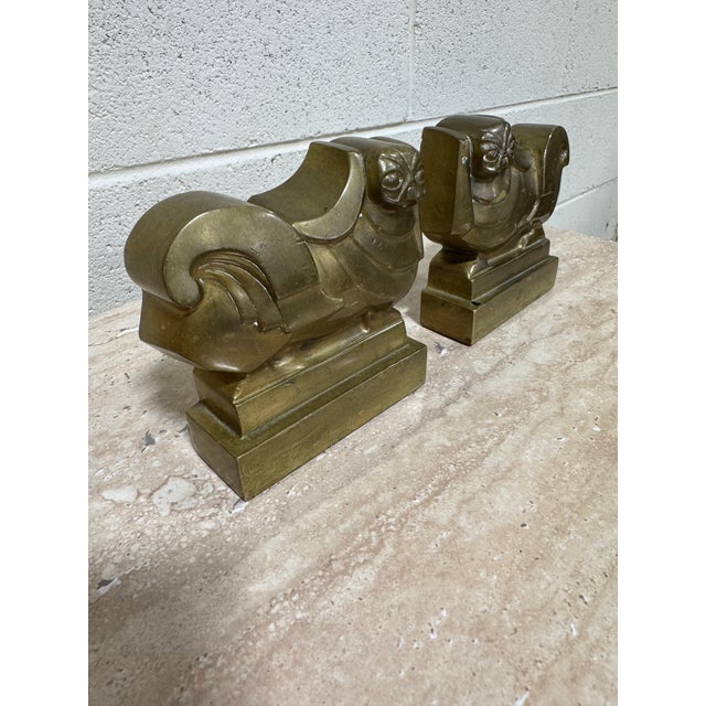 These are very heavy and appear to be bronze. I found a similar pair online but they were andiron. Anyway, very unique and...