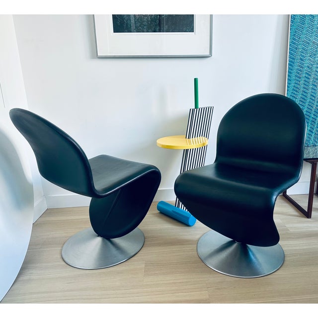 Verner Panton System 1-2-3 Swivel Chairs Design Verner Panton, 1973 Brushed aluminum base Black leather upholstery Made by...