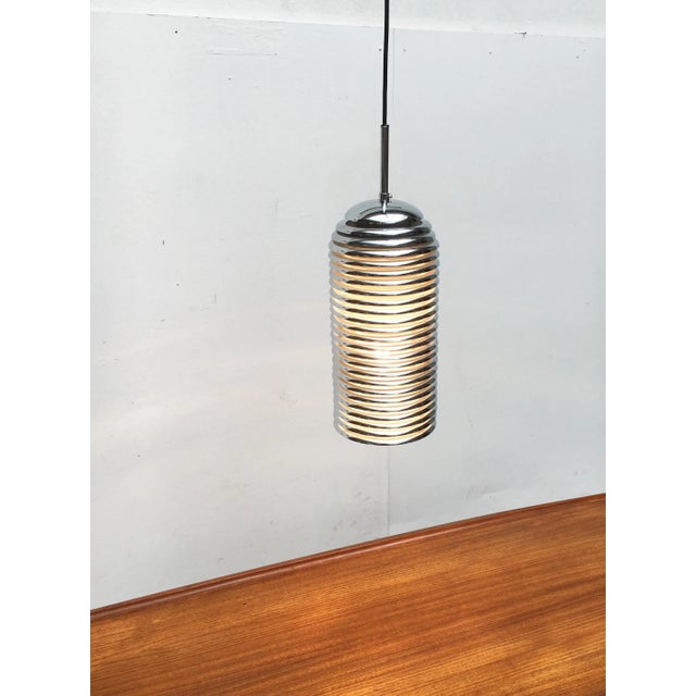 Saturno pendant lamp from Staff based on a design by Japanese designer Kazuo Motozawa from the 70s. Here in the narrow...