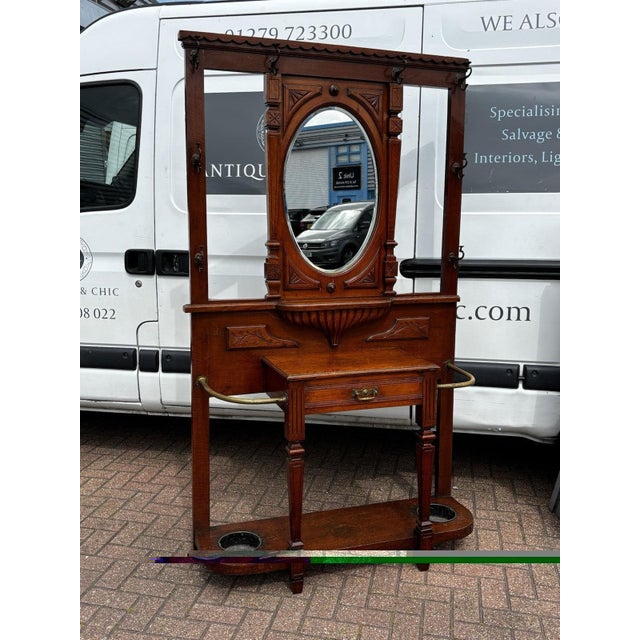 Victorian Oak Hall Stand with Mirror, Drawer And All Original Coat & Hat Hooks. This is an antique so will have signs of...