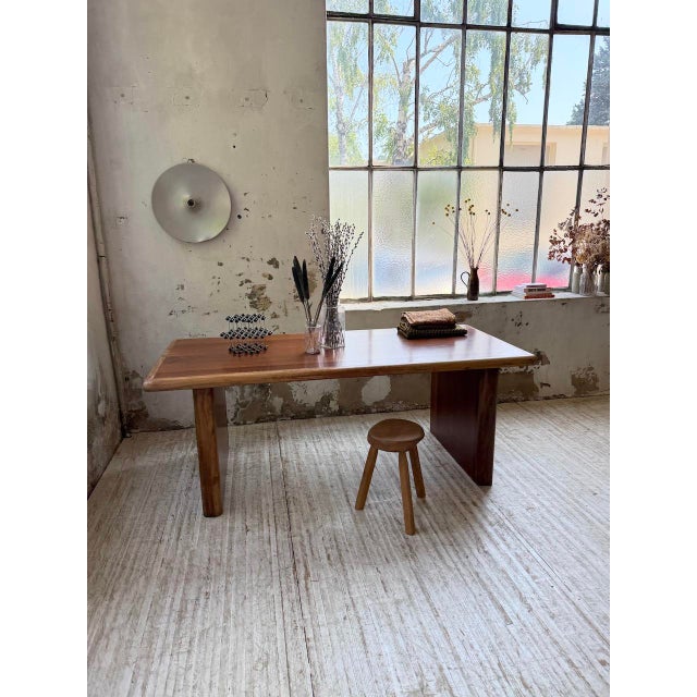 Antique table or desk from the 1970s, made of teak and teak veneer. we love the clean shape of the set as well as its...