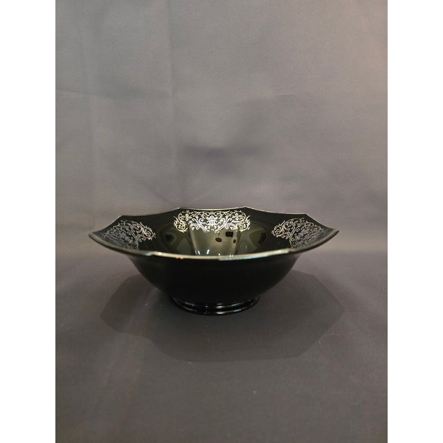 This is a vintage octagonal bowl made of black amethyst glass with sterling silver intricate floral details. This small...