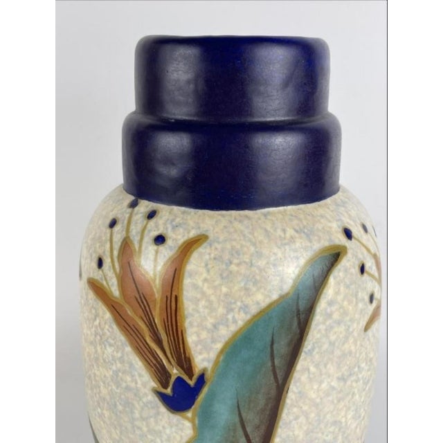 A vintage French Art Deco ceramic vase by Louis Fontinelle, signed and numbered 505 France 41. Hand-painted floral motifs...