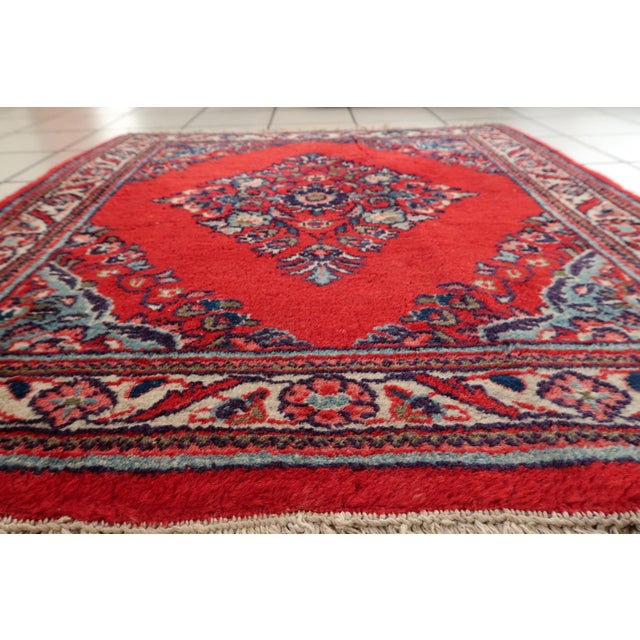 A distinctive and hard-to-find square-format vintage rug from the renowned Hamadan province. Woven in the 1970s, this...