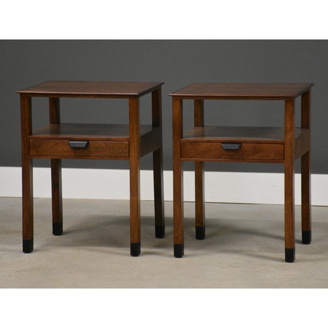 A rare pair of single drawer walnut nightstands designed by Edward Wormley for Dunbar. Circa 1950’s. Made in USA....