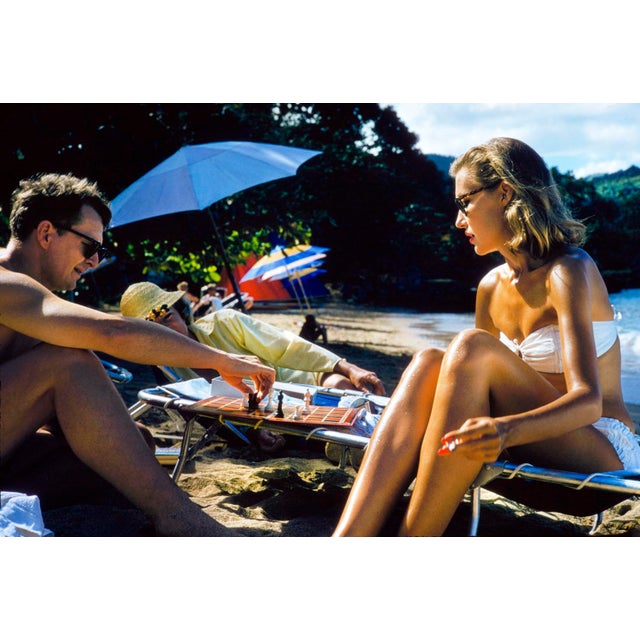 Montego Bay Chess by Toni Frissell A family enjoy a picnic on The Hampton's beach, Long Island 1955. (Toni Frissell)...