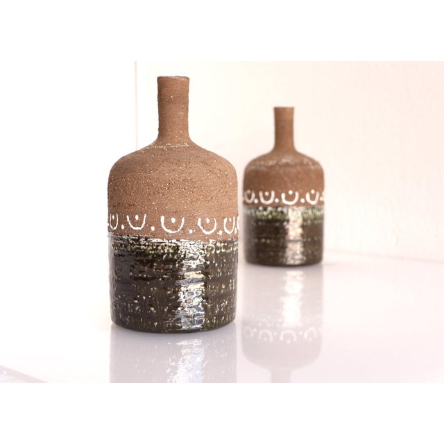 A pair of very nice Mid-century modern ceramic/stoneware vases hand-made by Thomas Hellström for Nittsjö Sweden. This is...