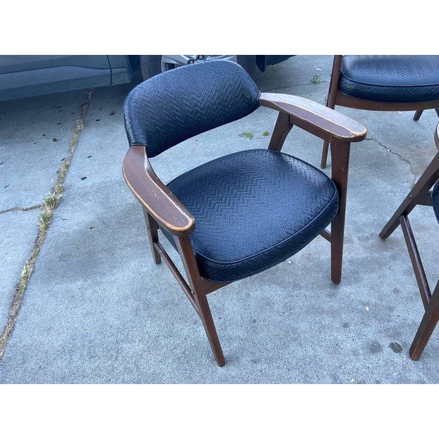 The Vintage Mid Century Modern Gunlocke-style Wood Woven Upholstery Side Armchairs by Paoly Style are a set of original...