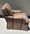 Elegant English-style club chair with matching ottoman from the collection of renowned Washington, D.C., interior designer...