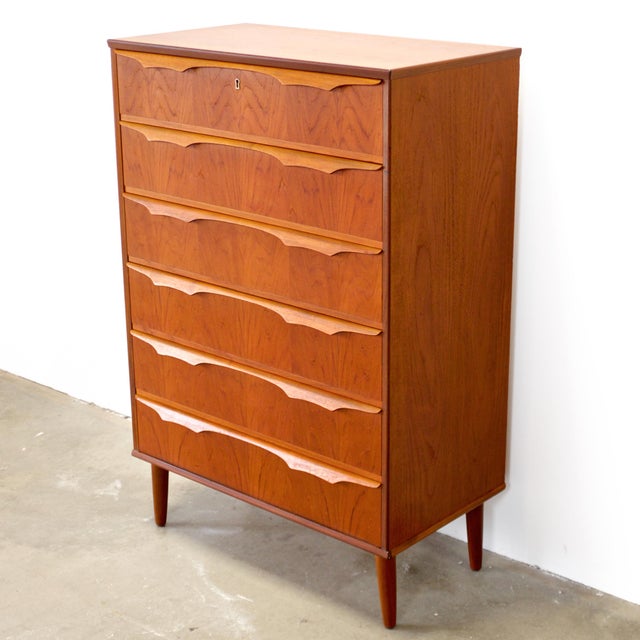 Dimensions: 32 1/8” L x 18” D x 48” H Origin: Denmark Designer: Claus (Klaus) Okholm Manufacturer: Trekanten–Hestbæk AS...