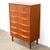Dimensions: 32 1/8” L x 18” D x 48” H Origin: Denmark Designer: Claus (Klaus) Okholm Manufacturer: Trekanten–Hestbæk AS...