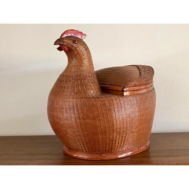 A wicker compartment basket in the form of a hen. From the Shanghai Collection of the 70’s. Exemplary of the artisan...