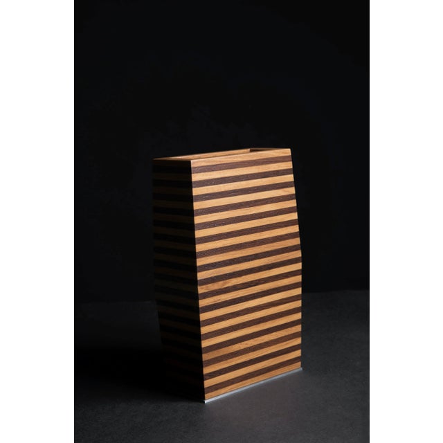 Luxury homewares are entering Pitsilkas hand-made luxury furniture collection: a hand-made wooden teak (Burma) & wenge...