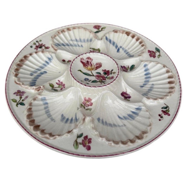 French Majolica oyster plate with flowers circa 1890 signed Longchamp.