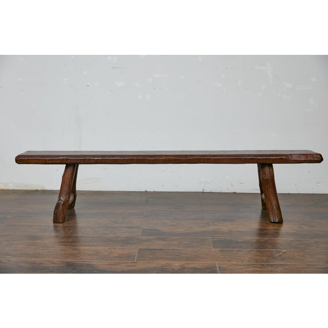 This American 20th-century long pine bench boasts a beautifully rustic charm, perfect for adding warmth and character to...