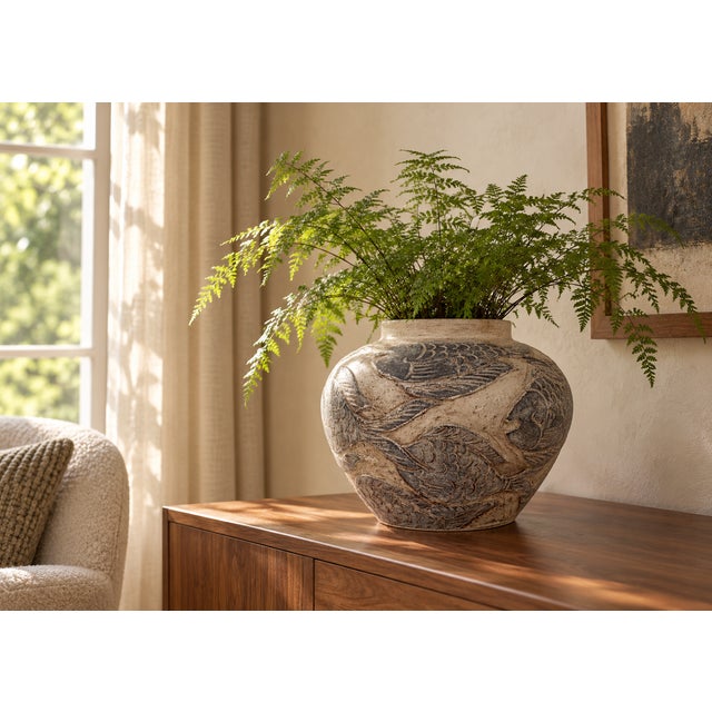 Striking vintage ceramic planter featuring an unusual all-over design of stylized fish rendered in raised relief. The...