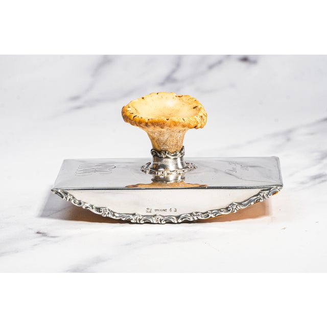 levate your desk with the unmistakable elegance of this antique Victorian sterling silver ink blotter, a refined and...