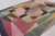 This 9 x 12 modern rug from India presents a bold exploration of mid-century modern abstraction through a vibrant...