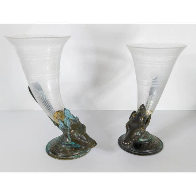 We are selling this cool pair of Continental European Cornucopias. These cornucopia have great bronze bases with stag deer...