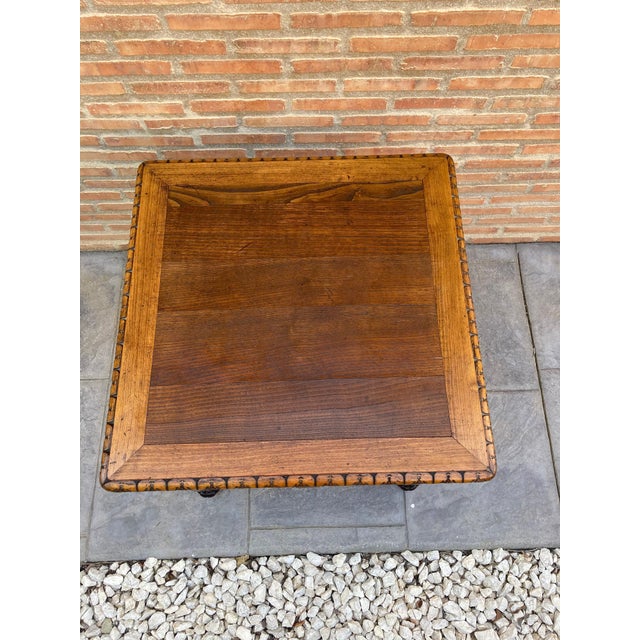 Mid century carved square walnut side table Louis Philippe style. Extraordinary Castilian walnut wood side table, with...