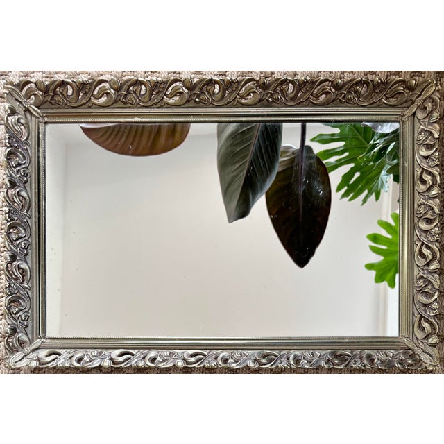 A superb vintage French Rococo style silver plate mirrored dresser tray. This gorgeous tray retains the original mirror...