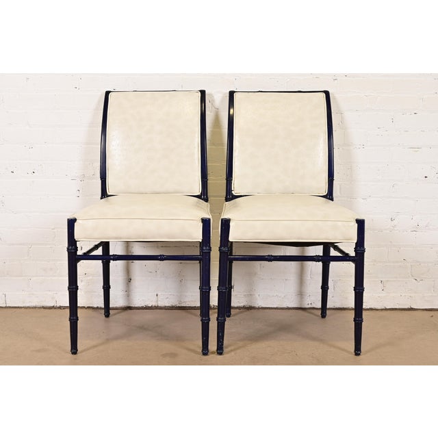 A gorgeous pair of mid-century Hollywood Regency side chairs or dining chairs In the manner of Baker Furniture USA, Circa...