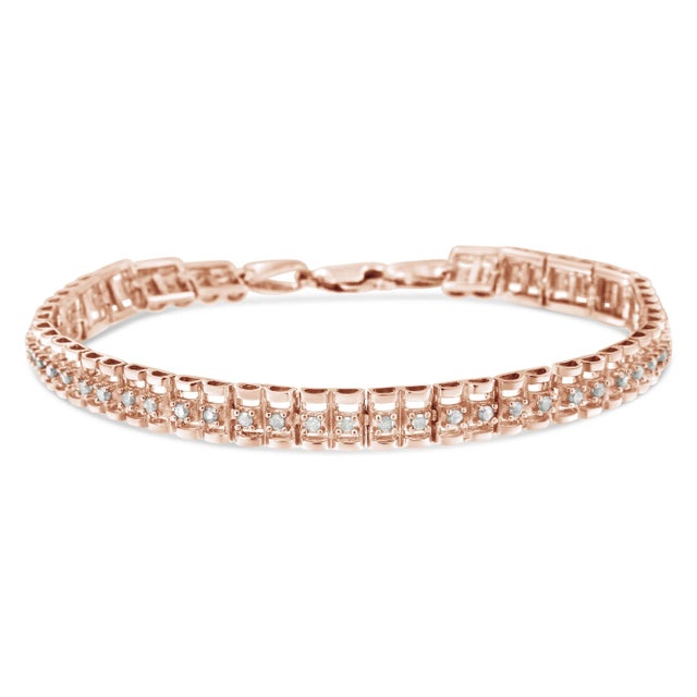 This gorgeous .925 sterling silver tennis bracelet features 1.0 carat total weight with 52 round, rose cut diamonds. The...