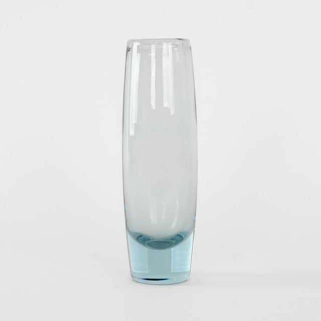 A subtle and elegant vase designed by Per Lütken for the Danish glassworks Holmegaard. It was made in the 1950s. Made of...