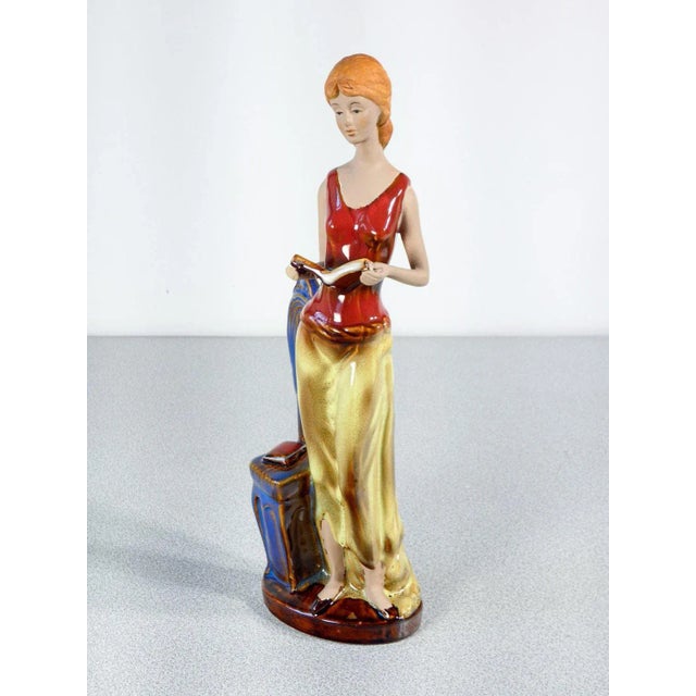 Glazed Ceramic Sculpture of a Woman with Books For Sale - Image 3 of 10