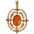 This carved cameo and seed-pearl-outlined Victorian pendant fashioned from intricately worked 10K yellow gold will turn...