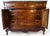 A scalloped apron graces the front of this French linen press featuring a black granite top. One drawer on the top level...
