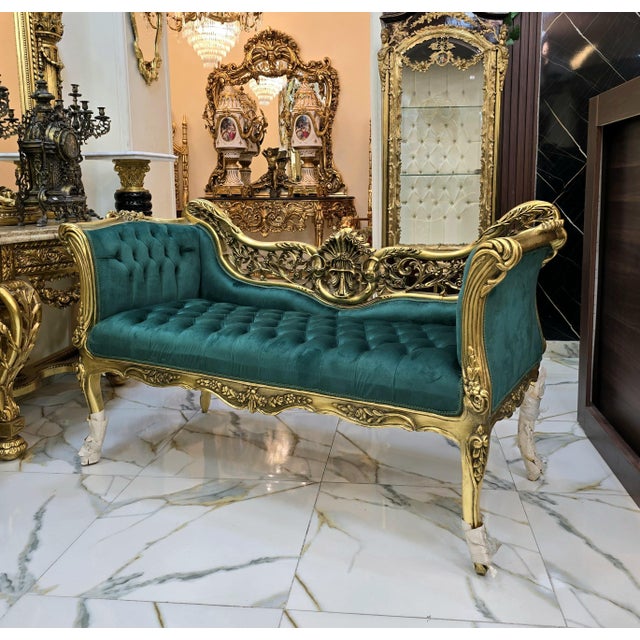 This exquisite French style sofa is a true masterpiece, intricately hand-carved from solid wood and finished in luxurious...