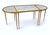An exceptional and highly sought-after French Maison Baguès tripartite coffee table, executed in richly patinated bronze...