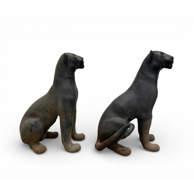 A wonderful pair of vintage bronze hand cast sculptures of panthers. The panthers have the seams indicative of having been...