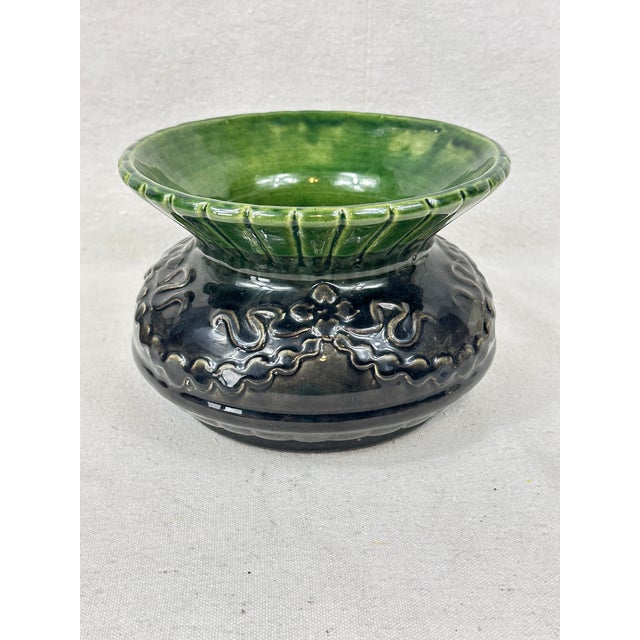 Antique Roseville blended glaze spittoon that can be used as a cachepot or a bowl for flower arrangements. This is a pre-...