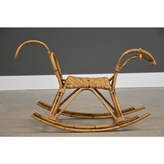 A mid century modern maple frame rocking chair designed by Jorgen Baekmark for FDB Mobler. Seat height is 16.5”. Made in...