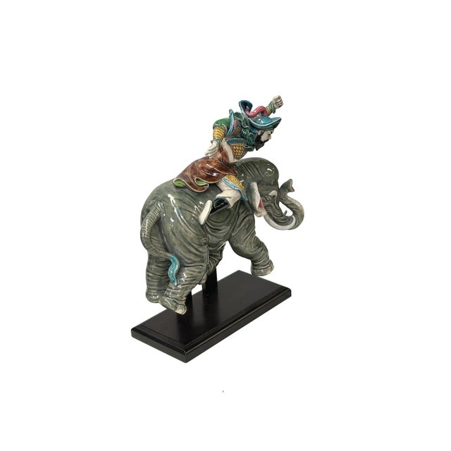 This striking art piece is a vintage Chinese ceramic figure, originally designed as a roof tile, featuring a warrior in a...