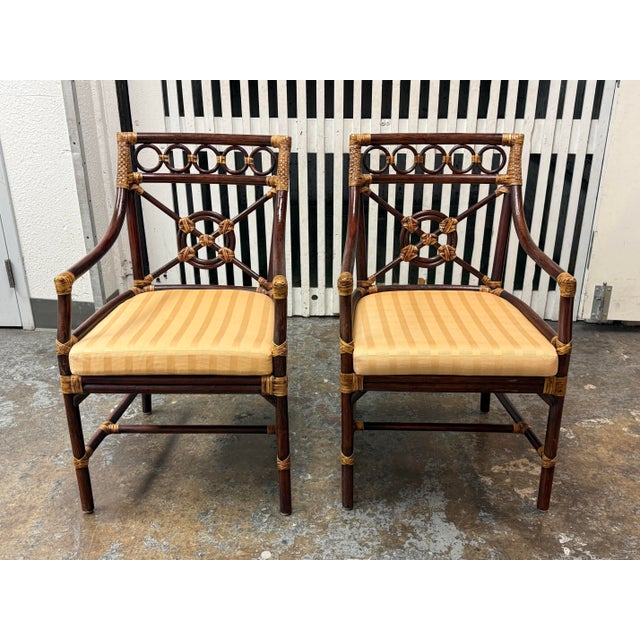 Design Plus Gallery presents a pair of Vintage McGuire Style Target Back Armchairs. These chairs showcase bamboo and...