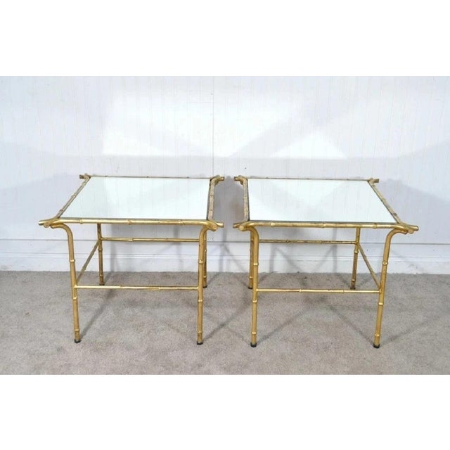 Vintage Italian Hollywood Regency Faux Bamboo Gold Gilt Iron Low Mirror Side Tables - a Pair. Circa Mid 20th Century....