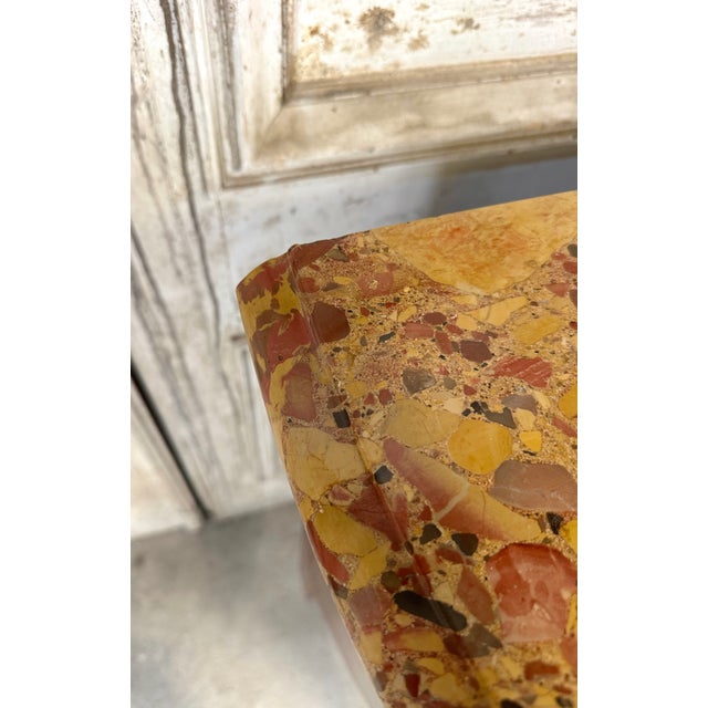 A louis xv style commode in red lacquer, circa 1900. With a curved front, it features two rows of drawers without a...