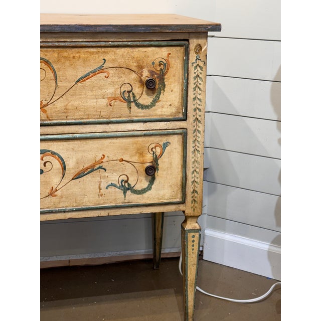 This piece is an Antique Venetian Style Italian Painted Chest of Drawers, also commonly referred to as a commode. This...