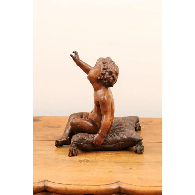 Baroque French 1780s Baroque Style Walnut Sculpture of Putto Sitting on a Pillow For Sale - Image 3 of 13