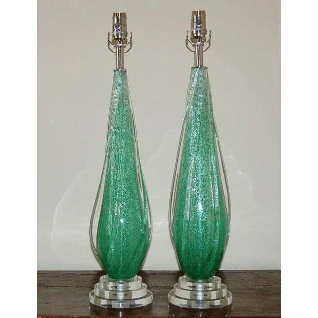 Rare COKE BOTTLE GREEN Pulegoso Venetian glass table lamps with Clear applied glass wings. The Pulegoso technique creates...