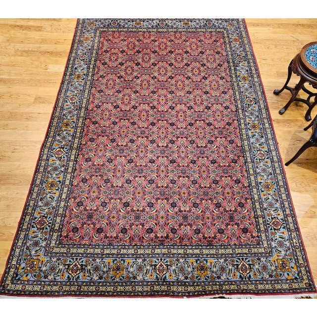 "This vintage Persian Tabriz rug features a rare and highly sought-after allover Herati geometric pattern, expertly hand-...