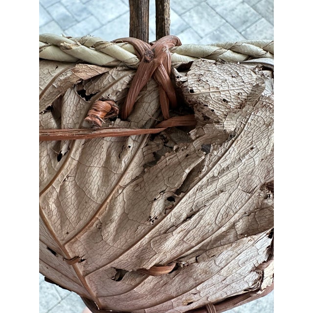 Vintage 1900s Primitive Natural Branch Handled Woven Husk and Leaf Basket For Sale - Image 12 of 12