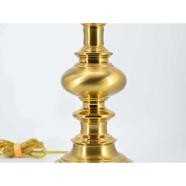 This sturdy solid brass table lamp is fully wired and features a single E26 socket that fits a standard bulb. The lamp...