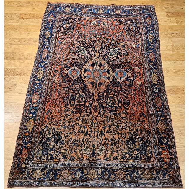 "An elegant early 20th-century Persian Bidjar area rug, masterfully hand-knotted and showcasing a bold medallion design...